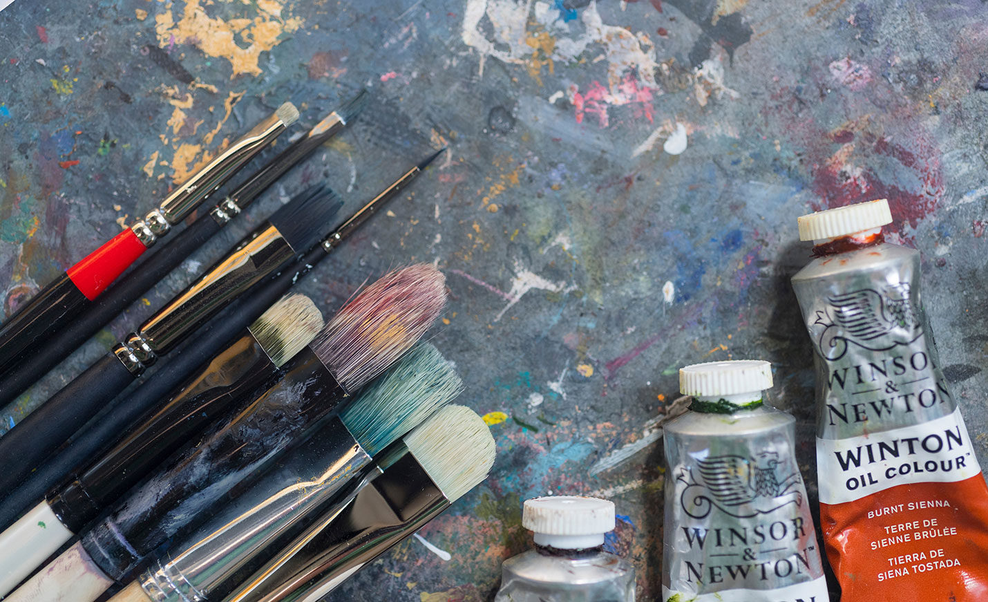 paint brushes and tubes