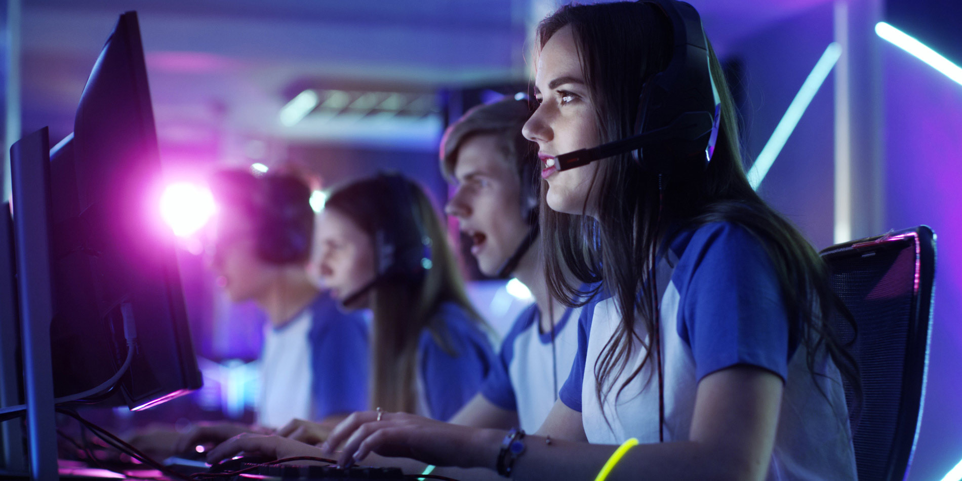 an Esports team playing video games on a computer