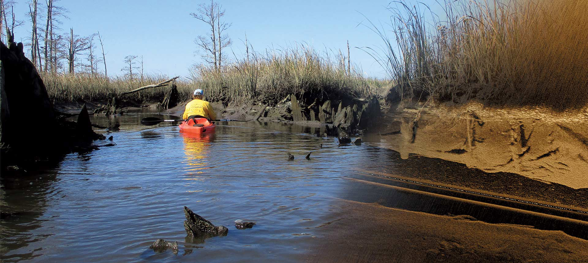a man kayaking on a river