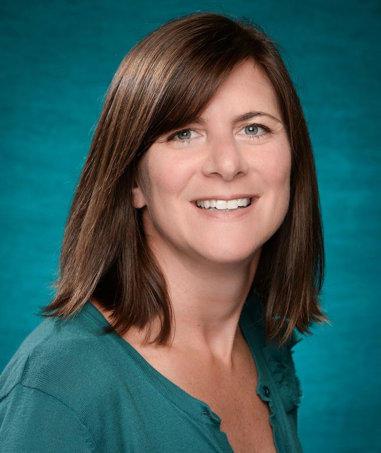 Headshot of Jen August