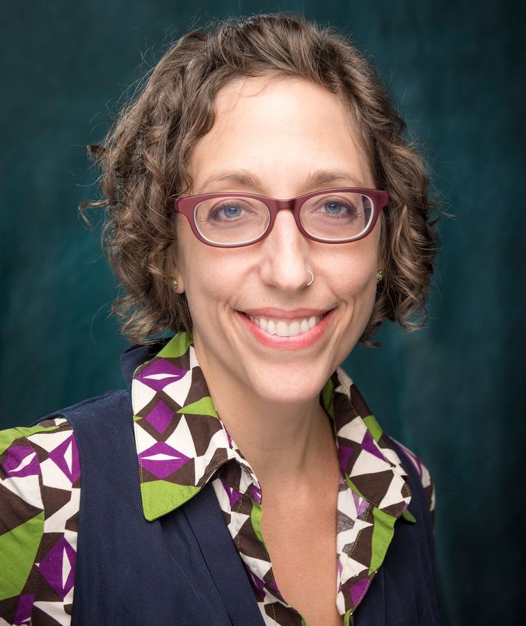 female faculty member smiling in portrait