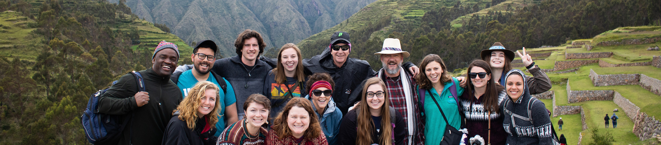 Group of students in front of mountains