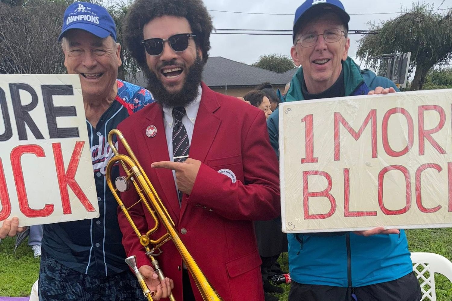 Jordan Jones poses with attendees of the 2026 Rose Parade