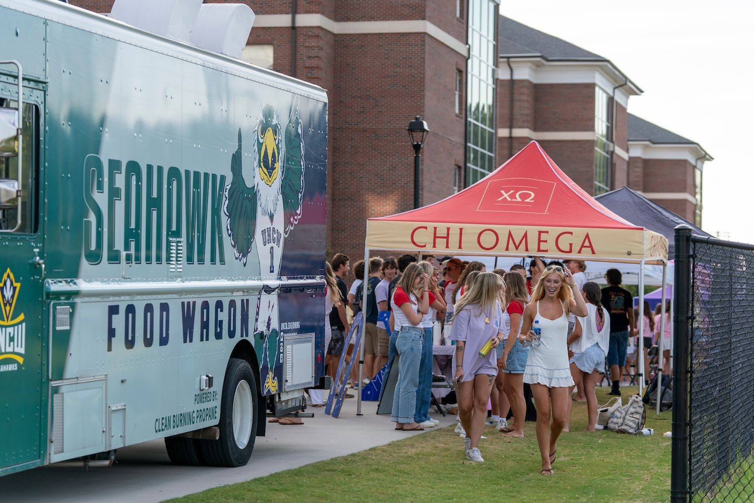 Students under a fraternity tent