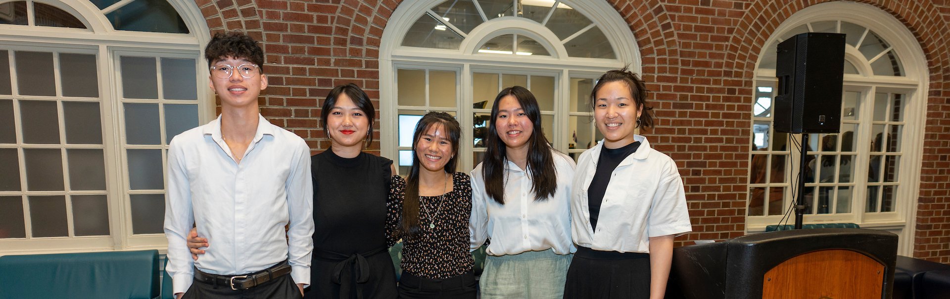 AHCC members smile for camera at an event